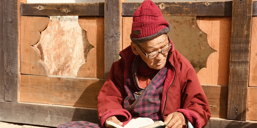 Old Man at Jambay Lhakhang In Bumthang 